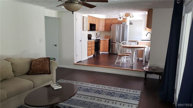 A view from the family room looking into the kitchen | Image 10