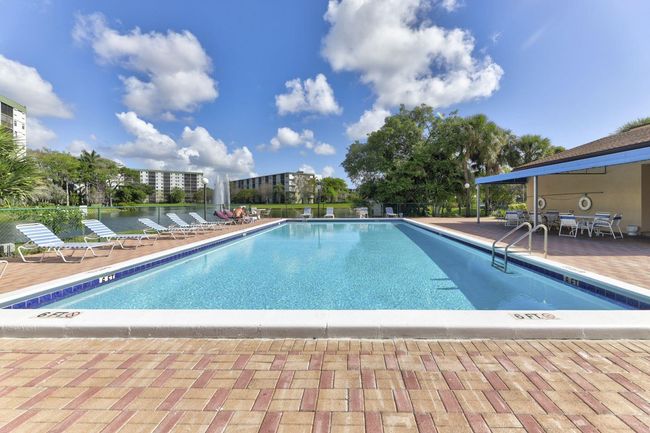 2nd Heated Clubhouse Pool for Parties and Events. This pool is Next to the Bar & Kitchen, Card Rooms, Library, Sauna, Gym all right here for Your use. | Image 59