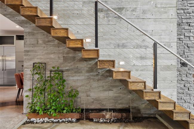 stairs to 2nd floor, fountain/hobby pond underneath | Image 21
