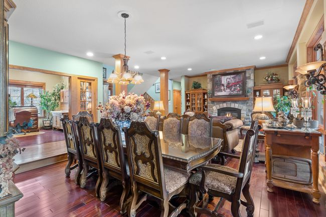 Formal Dining Room sunken from main hallway. Office, entry and living room are shown in background. Ceiling speakers part of whole house audio. | Image 4