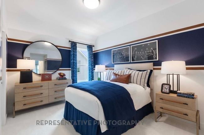 Bedroom with carpet floors and vaulted ceiling | Image 27