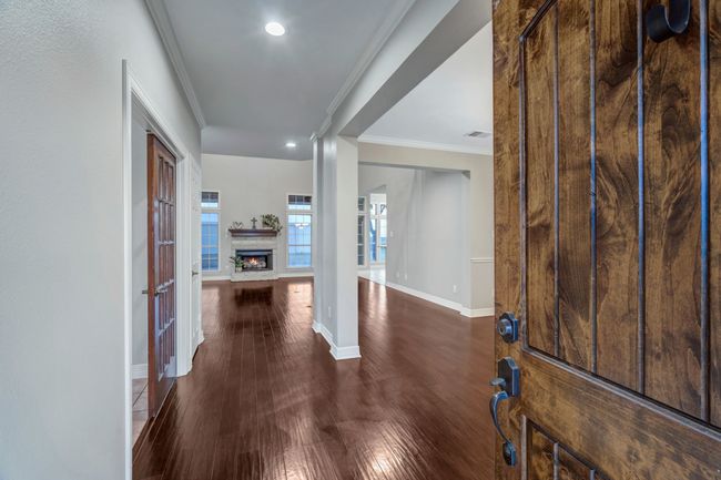 Extensive wood flooring in all living, dining and entry areas | Image 13