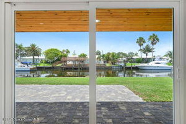 57 Riverview Ln, House other with 3 bedrooms, 2 bathrooms and null parking in Cocoa Beach FL | Image 71
