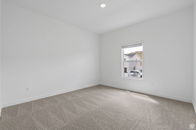 Spare room with carpet flooring, visible vents, baseboards, and recessed lighting | Image 13