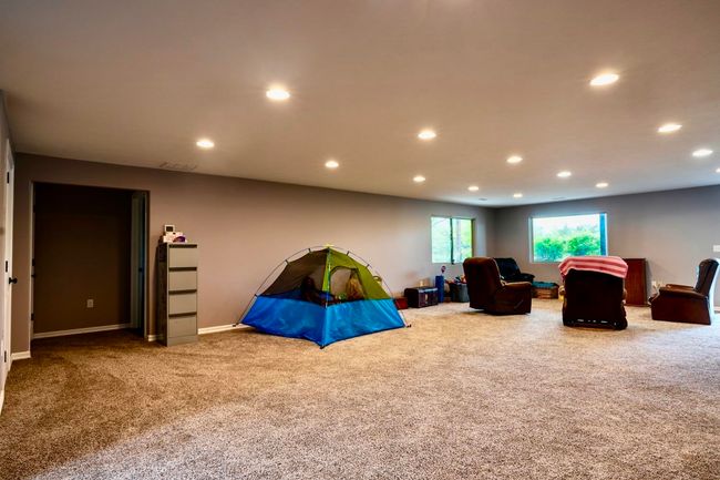 Carpeted bedroom featuring recessed lighting, baseboards, and visible vents | Image 35