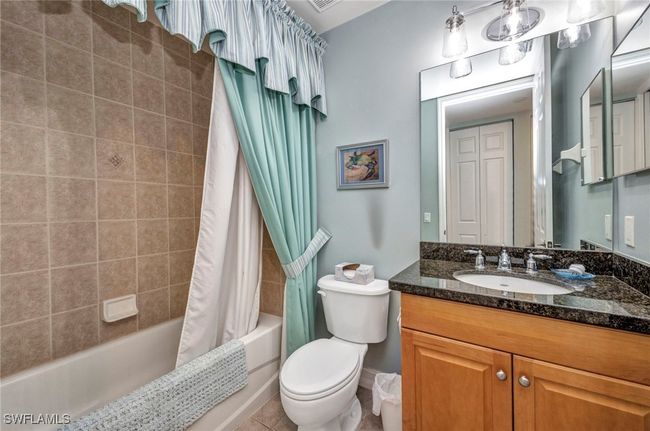 Full bath with shower / bathtub combination with curtain and vanity | Image 27