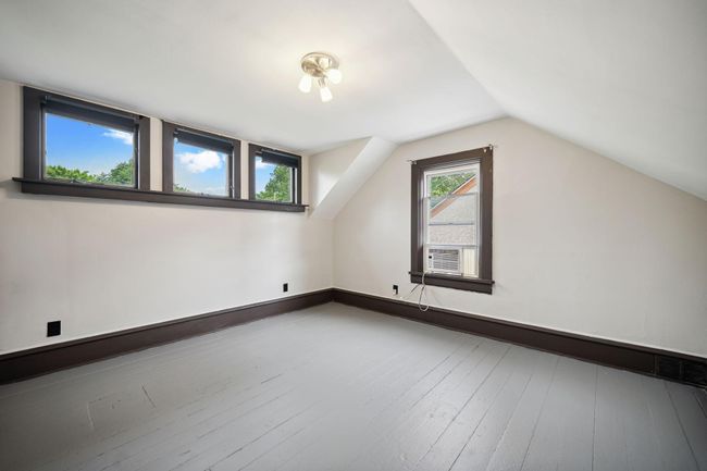 Lots of light brightens this upper level bedroom | Image 17