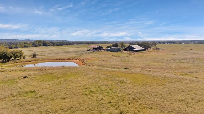 Drone / aerial view with a water view and a rural view | Image 15