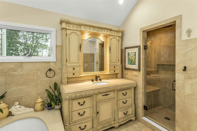 Primary Bathroom with Beautiful Vanity and Large Shower | Image 16