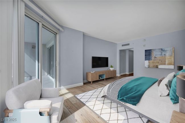 Virtually Staged Bedroom featuring wood finished floors, visible vents, and baseboards | Image 53