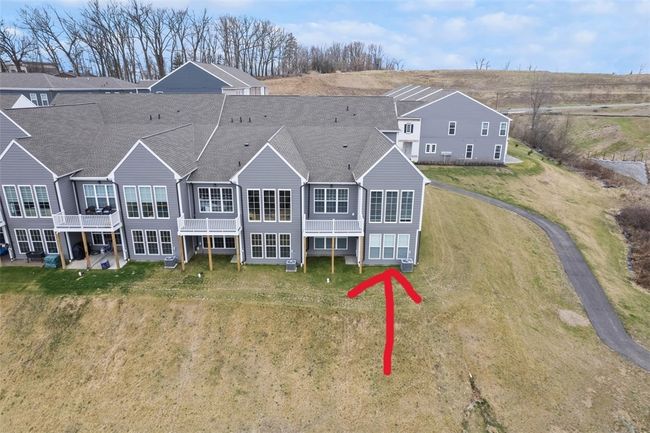 End unit with walking trail to lake | Image 36