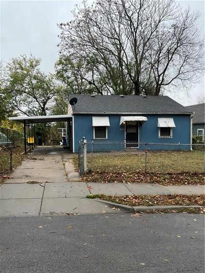 View of front of property with a carport | Image 1