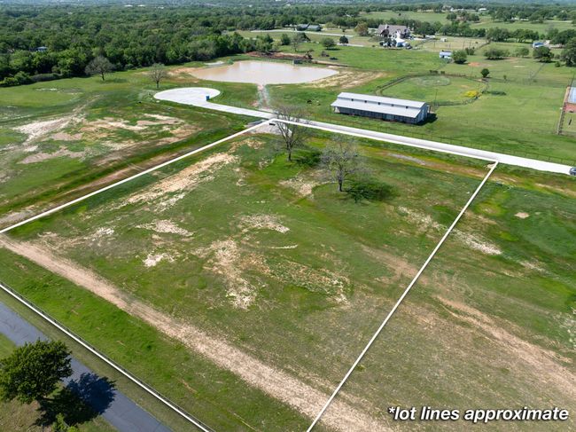 Aerial view featuring a water view | Image 16