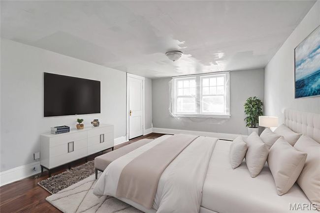 Bedroom with baseboards and dark wood-style flooring | Image 12