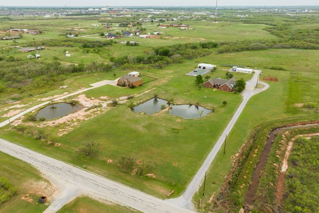 Aerial view featuring a rural view and a water view | Image 35