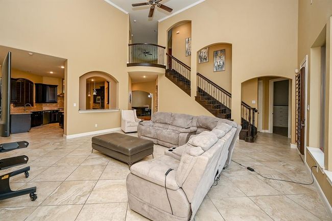 Spacious Living Room with Crown Molding | Image 13