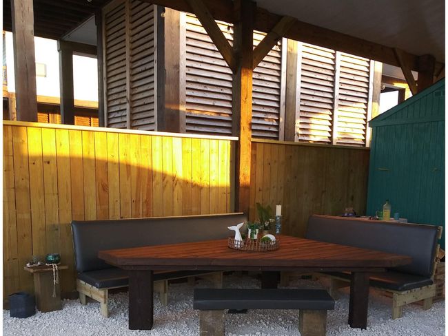 Custom built-in table and benches. | Image 11