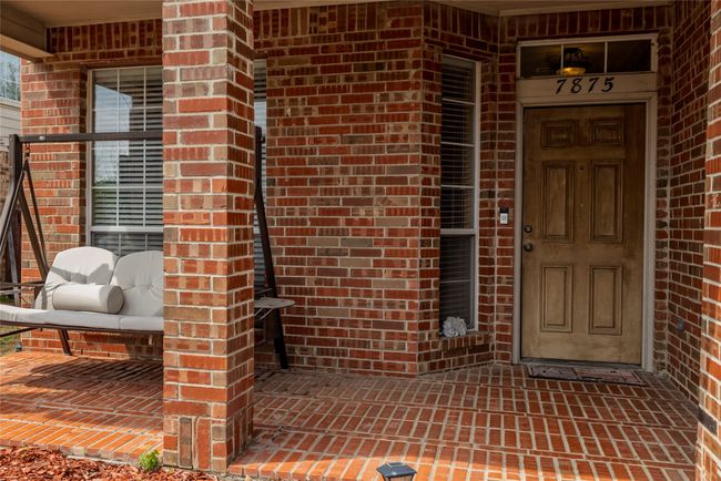 Entrance to property featuring brick siding | Image 4