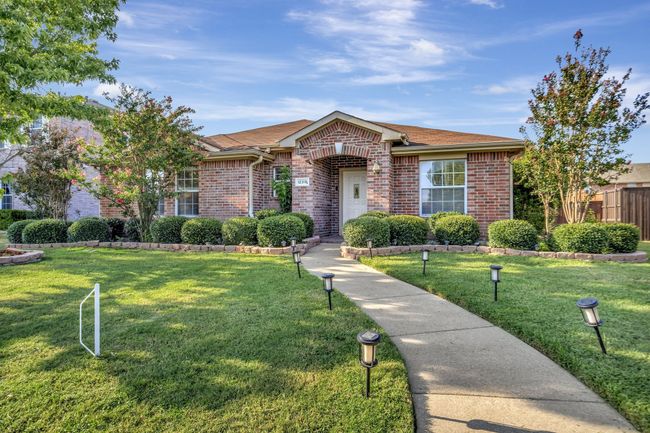 Ranch-style house with a front lawn | Image 4