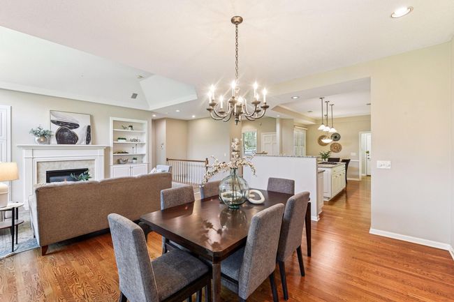 Seamless living, dining, and kitchen sightlines for modern life. | Image 7