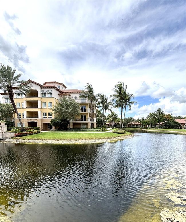 Pool area with gourgeos lake view | Image 44