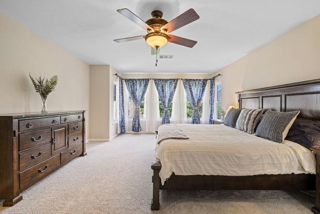 Soft natural light and neutral finishes make this a perfect place to unwind at the end of the day. | Image 18