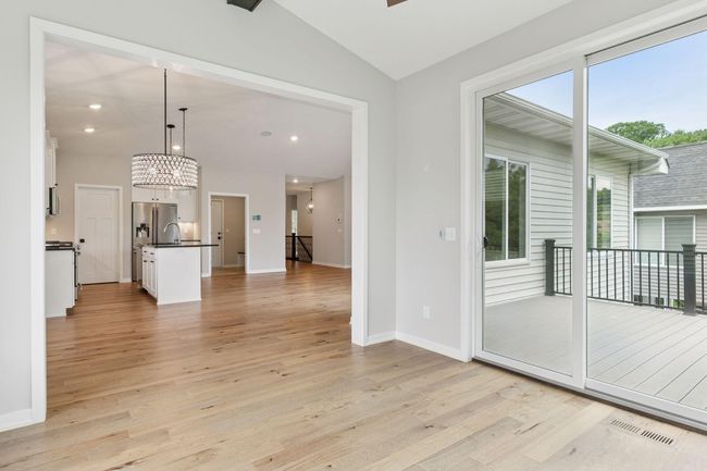 Sliding door leads to maintenance free deck...Andersen doors and windows throughout | Image 22
