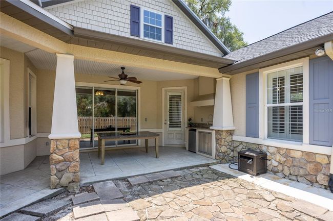 Side patio with the making for the perfect outdoor entertaining space! | Image 26