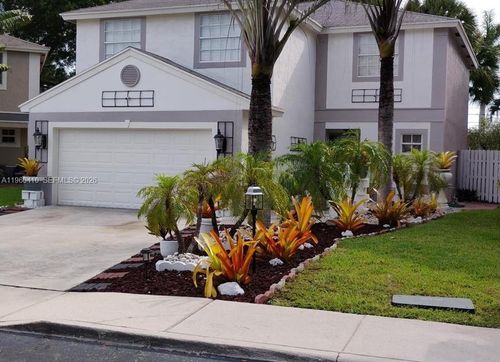 110 E Riverbend Dr, Sunrise, FL, 33326-2224 | Card Image