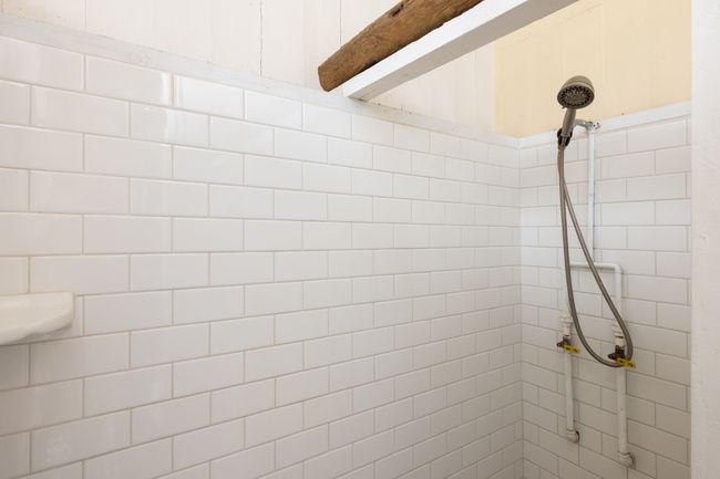 Walk in shower and toilet, along with the free standing vanity. | Image 13