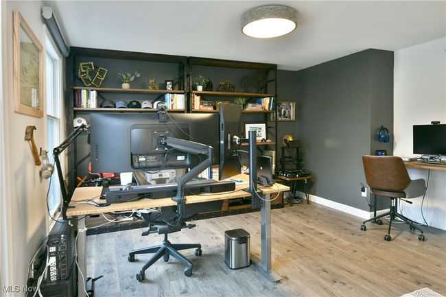 Office area with baseboards and wood finished floors | Image 19