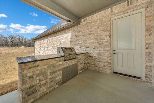 View of patio / terrace featuring area for grilling and grilling area | Image 35