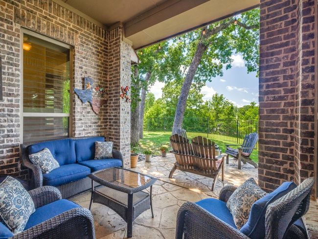 View of patio / terrace featuring an outdoor hangout area and fence | Image 21