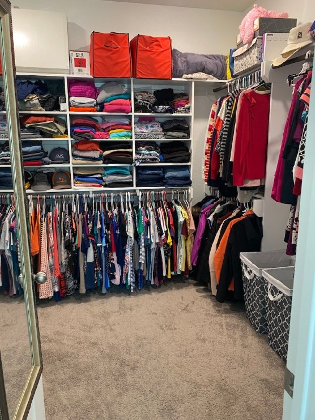 Walk in closet featuring carpet flooring | Image 22