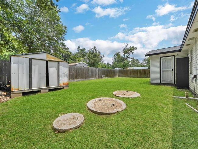 27015 Coach Light Ln, House other with 3 bedrooms, 2 bathrooms and null parking in New Caney TX | Image 28