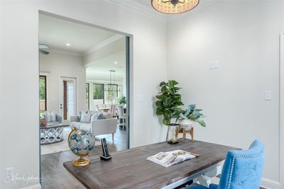 Dining room with ceiling fan, ornamental molding, and hardwood / wood-style floors | Image 2