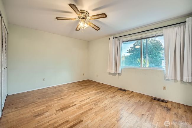 Primary bedroom, angle 1 (window faces front of home) | Image 24