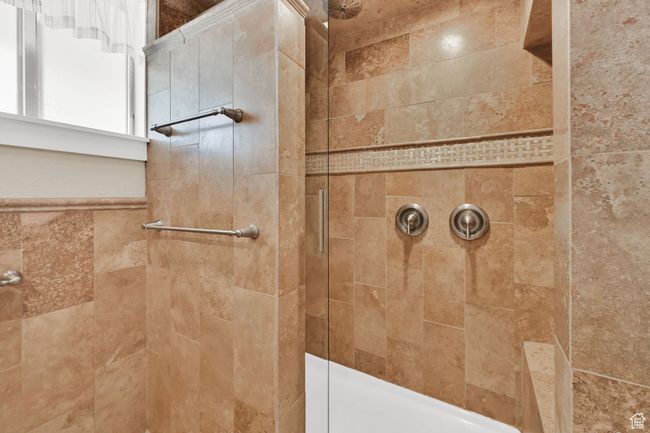 Full bathroom featuring a tile shower | Image 16