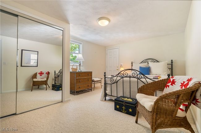 Carpeted bedroom featuring baseboards | Image 14