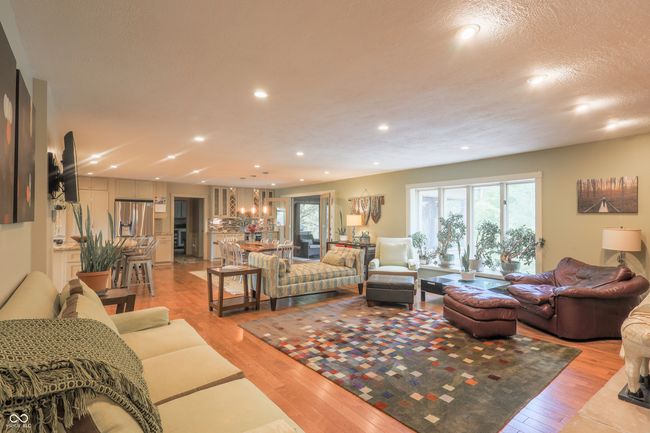 living area with recessed lighting and light wood-style flooring | Image 18