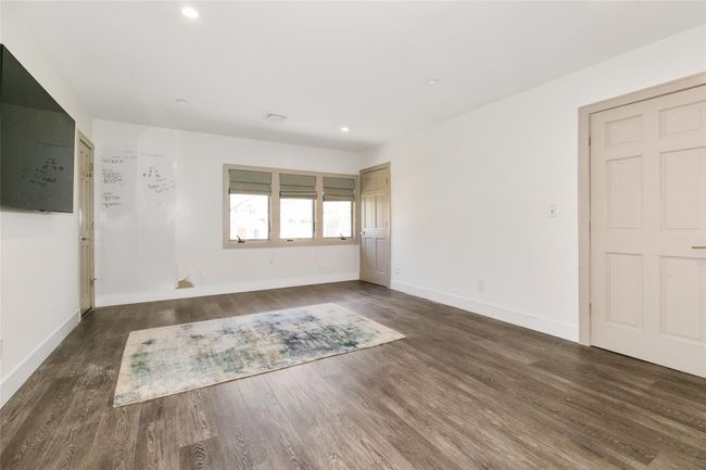 Unfurnished room featuring recessed lighting, wood finished floors, and baseboards | Image 14