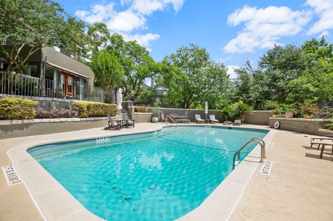Community pool with a patio | Image 24