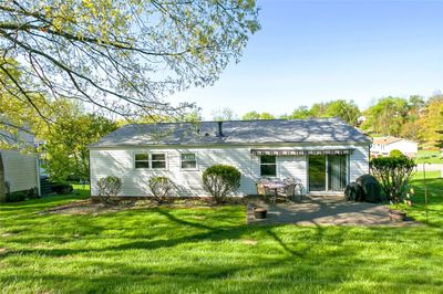 Level rear yard and a patio off of the dining room | Image 3