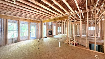 View of front of house featuring a garage | Image 2