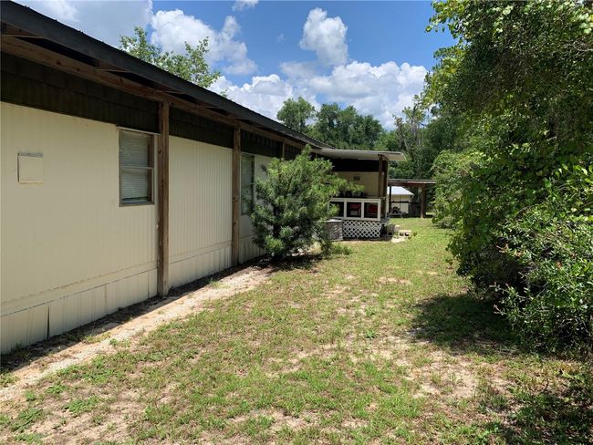 24645 Ne 177 Th Ter, House other with 2 bedrooms, 1 bathrooms and null parking in Fort Mc Coy FL | Image 66
