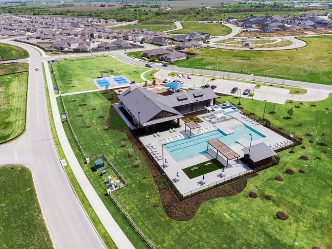 Aerial perspective of suburban area featuring a pool area | Image 37