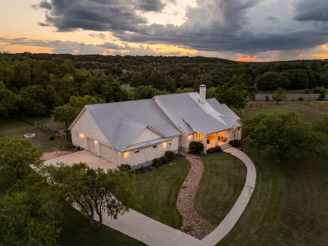 For car enthusiasts or those needing extra space, the property features a 3-car attached garage plus a 3-car detached garage. | Image 36