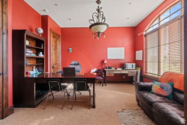 Carpeted home office featuring a healthy amount of sunlight | Image 14