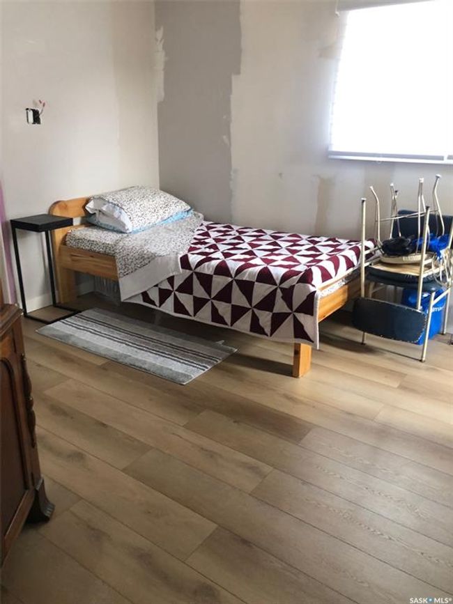 Bedroom featuring hardwood / wood-style floors | Image 36