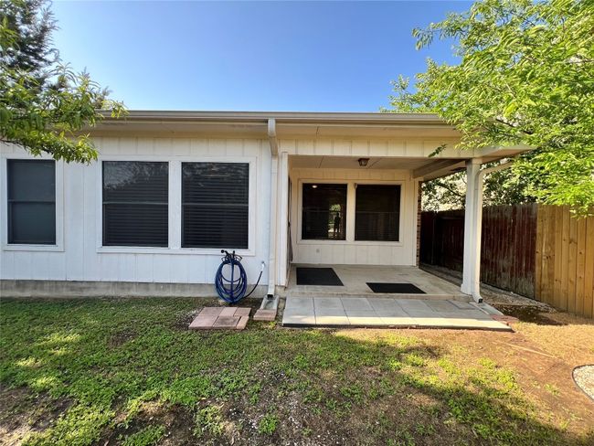 Rear view of house featuring a patio | Image 16